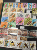 Lot de timbres Togo multicolores thématiques Afrique fleurs oiseaux poissons
