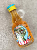 Mini bouteille alcool Dennis Corfu, étiquette couleur, partiellement remplie