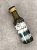 Miniature liqueur Mandarine Impériale Grande Cuvée bouteille verte partiellement