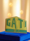 Pin's publicitaire vintage émail GATI SA années 80 jaune vert badge rétro