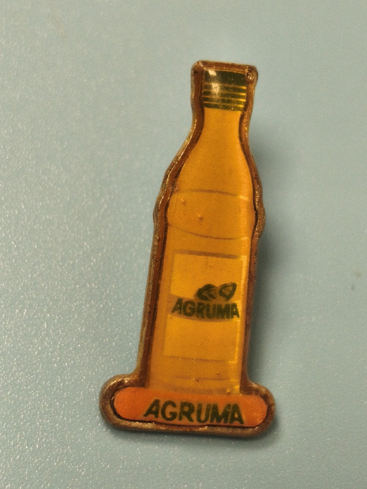 Pin's vintage AGRUMA bouteille orange publicitaire ancien collection (Ref 9)