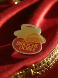 Pin's publicitaire vintage La Brioche Dorée ancien rétro logo boulangerie