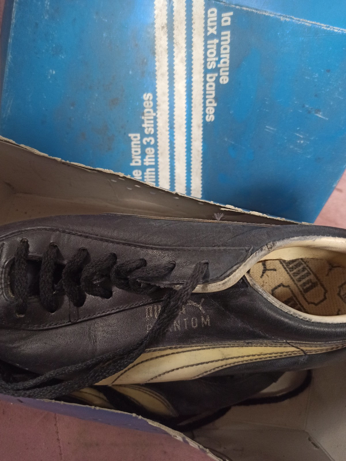 Baskets Puma vintage rétro noires blanches, sneakers de collection d?occasion