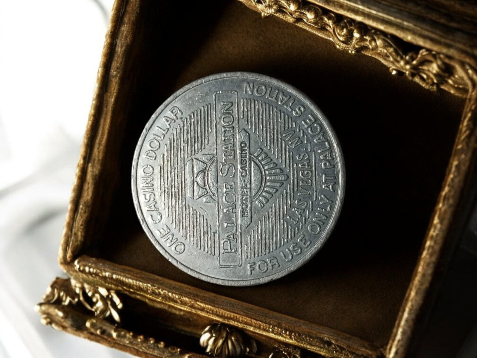 Jeton casino métal Palace Station Las Vegas vintage – dollar token ancien