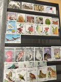 Lot de timbres thématiques Laos oblitérés motifs animaux fleurs sports avion