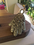 Pendentif main Hamsa vintage métal années 50 motif ajouré oriental