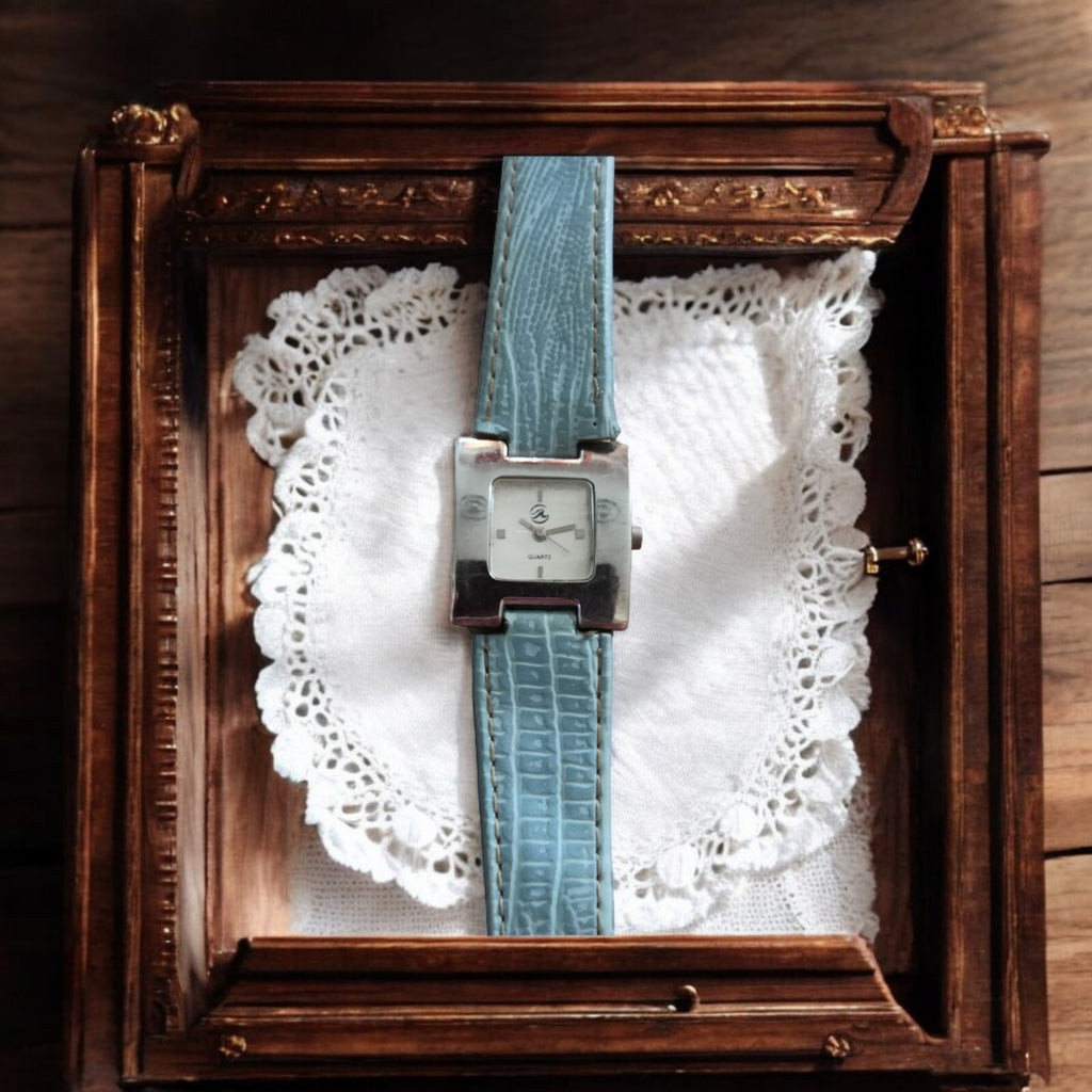 Montre Vintage Cuir Bleu Élégante - Histoire et Style Uniques