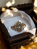 Broche vintage métal doré ajouré pierre bleue, bijou fantaisie rétro