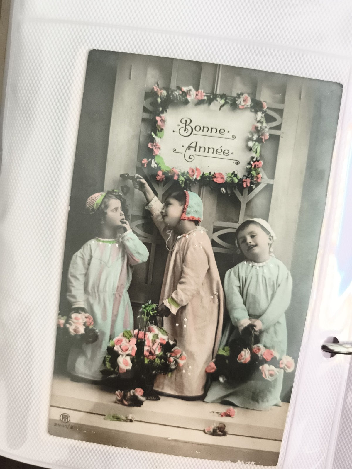 Carte postale ancienne Bonne Année enfants fleurs colorisée CPA