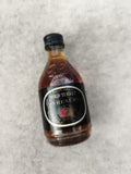 Mini bouteille Wild Turkey 1855 Reserve bourbon partiellement remplie