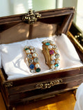 Élégantes boucles d'oreilles vintage en métal doré et strass - Style rétro glam