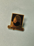 Pin's vintage Groupe Réalité logo doré noir collection musique rare