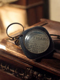 Porte-clés publicitaire vintage Le Figaro loupe rétro années 60-70
