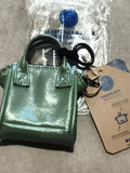 Mini pochette Cabaia vert d’eau effet verni, porte-clés, neuf emballé