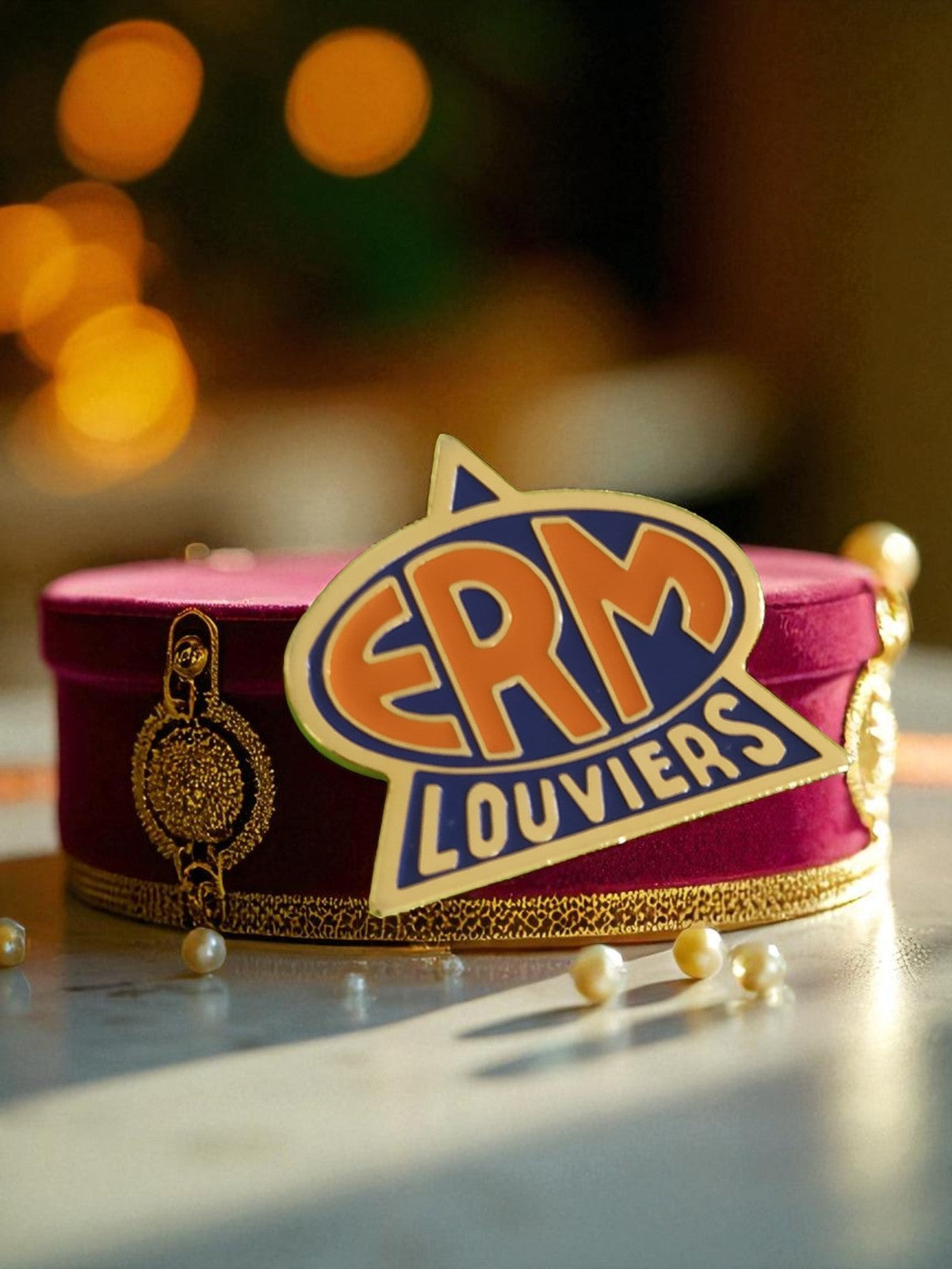 Pin's publicitaire vintage ERM Louviers édition limitée, logo émaillé