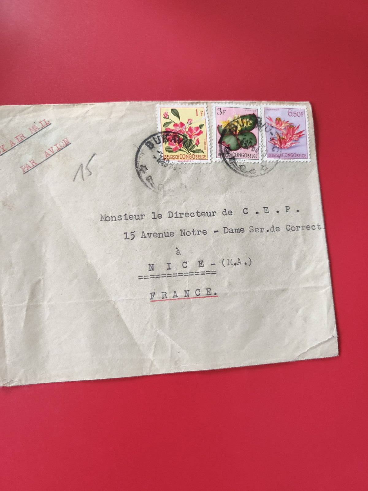 Enveloppe affranchie Congo Belge avec timbres fleurs, cachets visibles