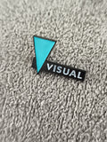 Pin's vintage VISUAL triangle bleu turquoise années 80 noir (Ref 8) badge rétro