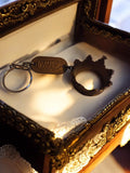 Porte-clés vintage métal silhouette château RIHA, anneau publicitaire rétro