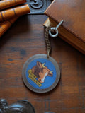 Porte-clés vintage La Vache Gros Jean publicitaire rond, visuel bleu rétro
